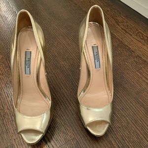 Gold peep toe Prada heels